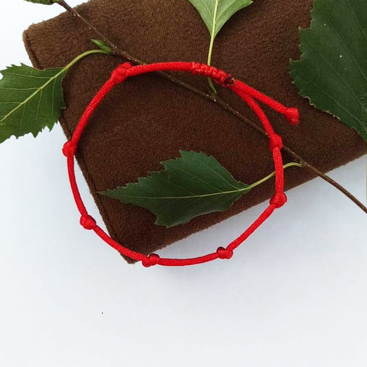 червен конец, червен конец с възли, червен конец гривна, червен конец на бебе, червен конец със седем възела