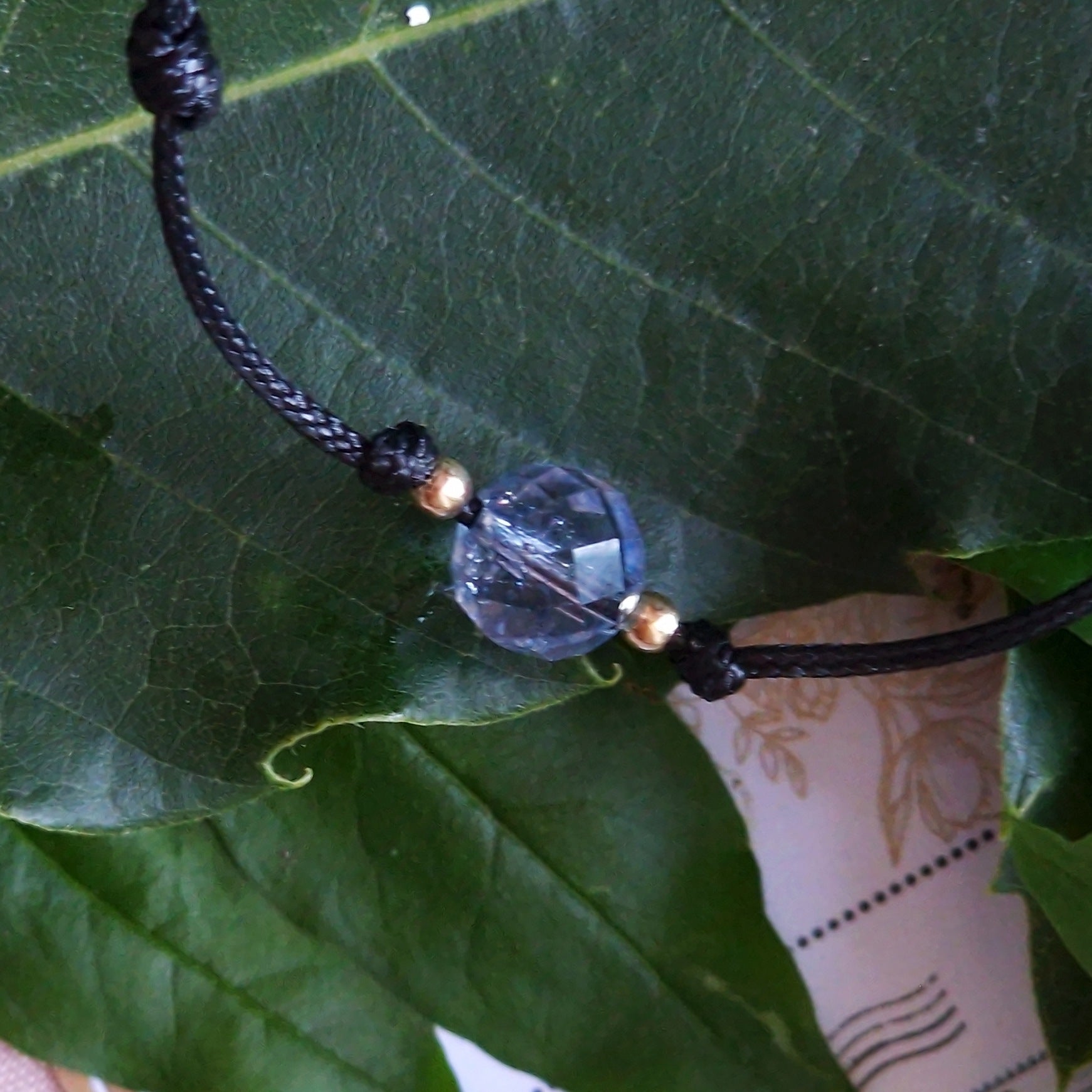 Гривни черен конец и злато, гривни син топаз